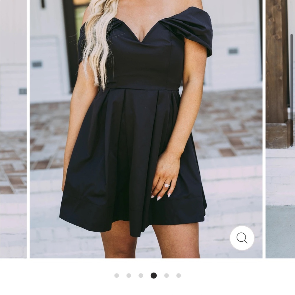 Tags in tact black cocktail dress